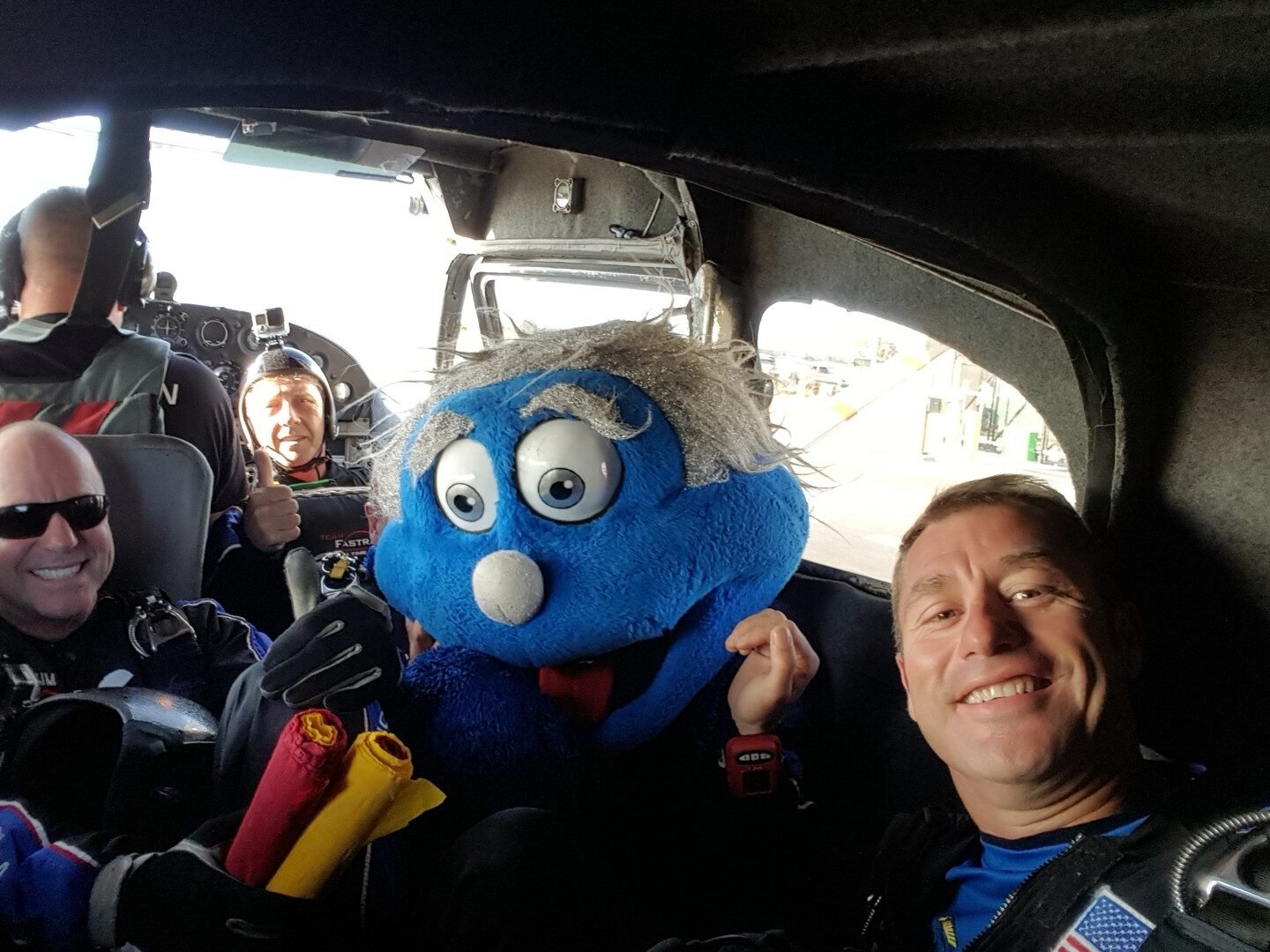 Mascot boards the plane